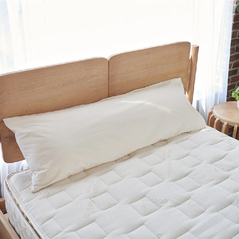 Round Pillows for Boho-Style InteriorsNaturepedic Non-Toxic Body Pillow