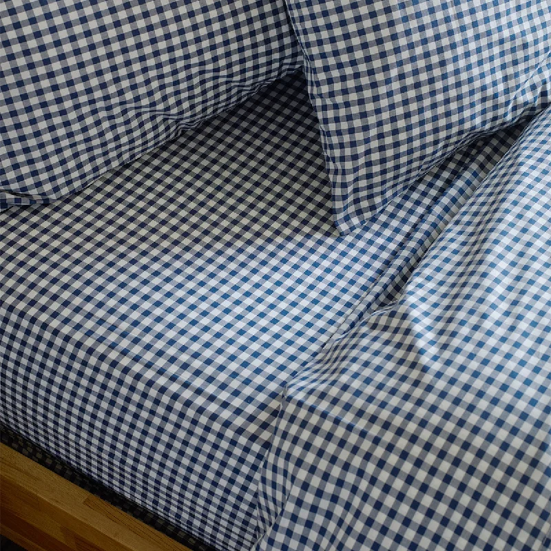 Comforters with a seasonal design for holiday - themed decor​ Indigo Small Gingham Cotton Fitted Sheet