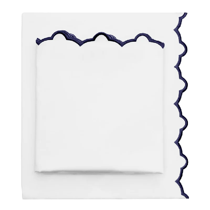Sheets with a nautical - inspired design for a maritime and coastal look​ Navy Scalloped Embroidered Sheet Set (Fitted, Flat, & Pillow Cases)