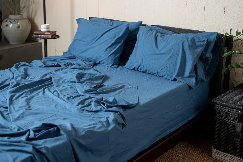Comforters with a reversible pattern for double the style options​ Crinkle Percale Organic Cotton Sheet Set + Pillowcases