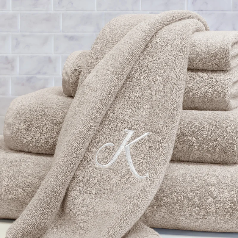 Sheets with a polka - dot design for a fun and playful style​ Plush Light Beige Bath Sheet