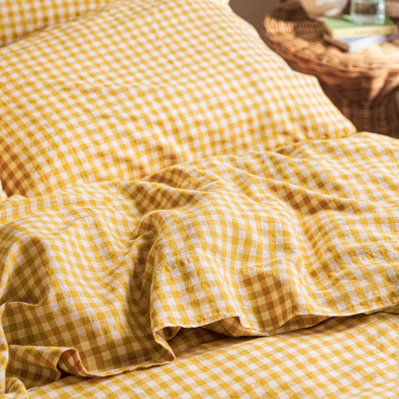 Quilted comforters providing added texture and warmth​ Honey Gingham Linen Blend Flat Sheet