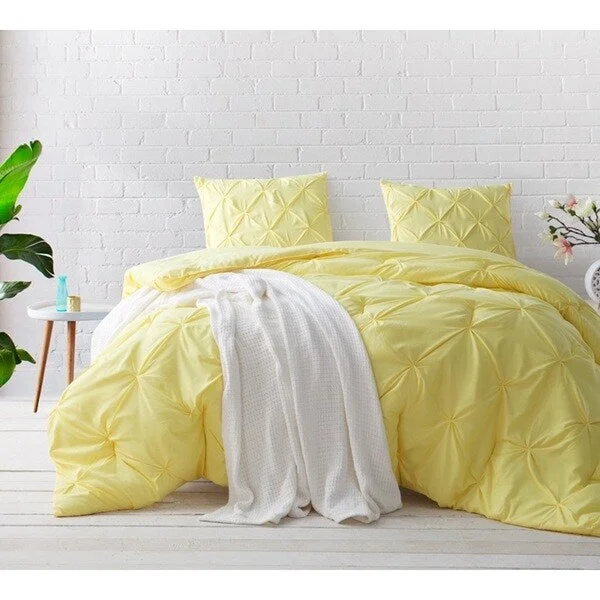 Goose down comforters known for their superior quality and insulationBYB Limelight Yellow Pin Tuck Comforter Set