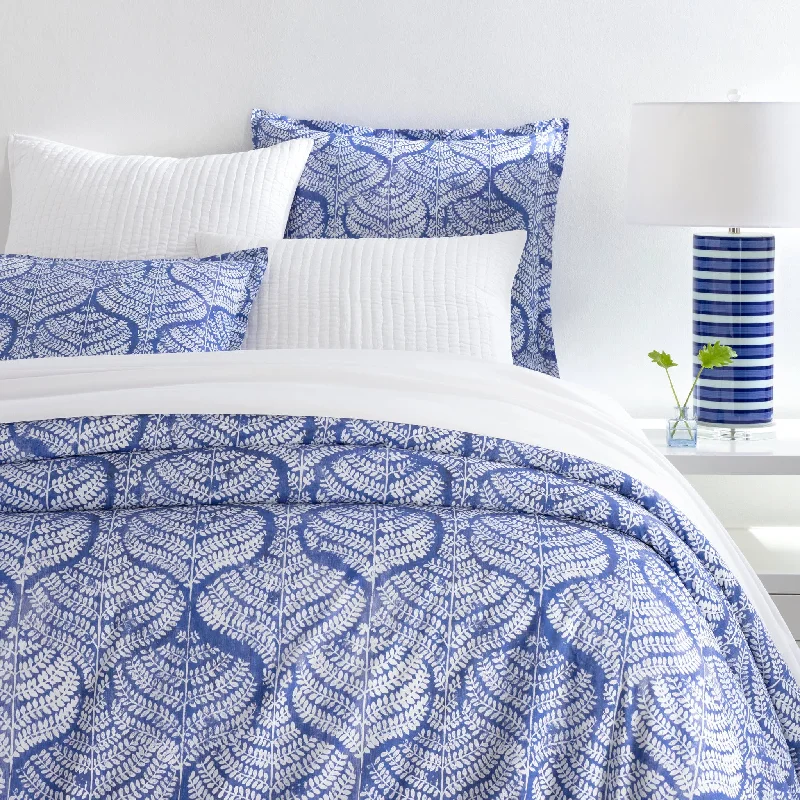 Solid - colored duvet covers in classic colors like white, black, and navy for a timeless lookFlora Blue Duvet Cover