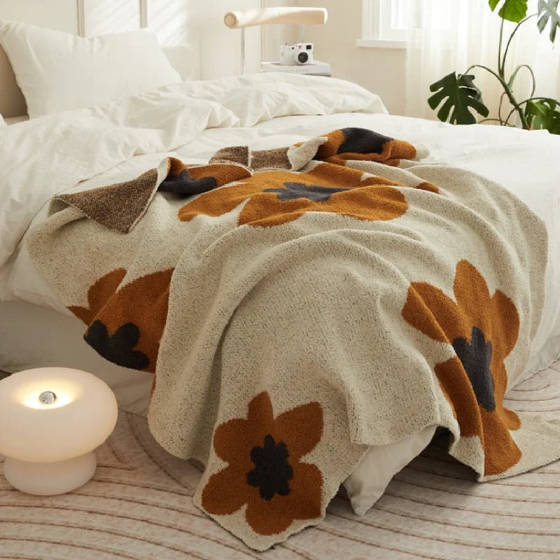 Acrylic blankets for a soft and affordable alternativeCozy Earth Tone Floral Blanket / Orange + Beige