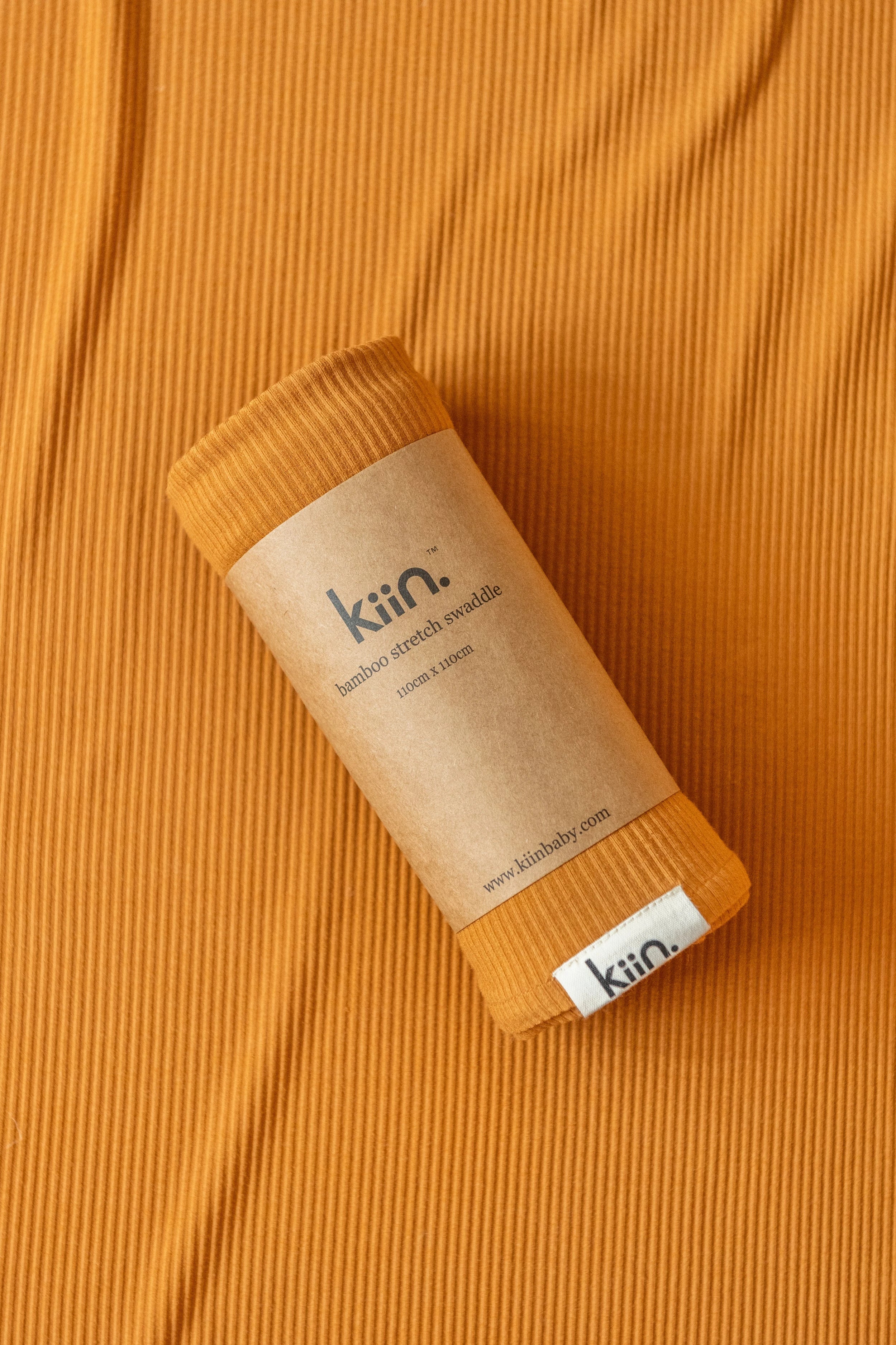 Linen blankets with a rustic and textured lookKiin Organic Bamboo Stretch Swaddle - Caramel