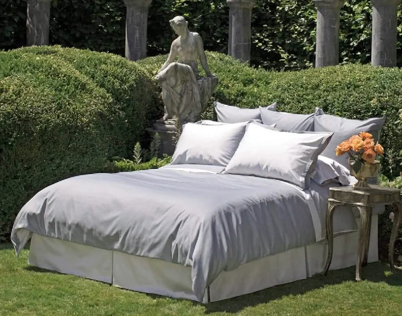 Patchwork duvet covers with a variety of fabric pieces sewn together for a rustic charmChambray Sheeting