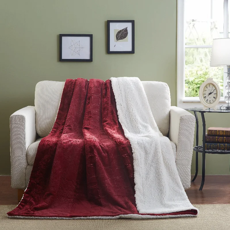 Recycled polyester blankets for an eco - conscious optionTache Solid Embossed Merlot Red Sherpa Throw Blanket